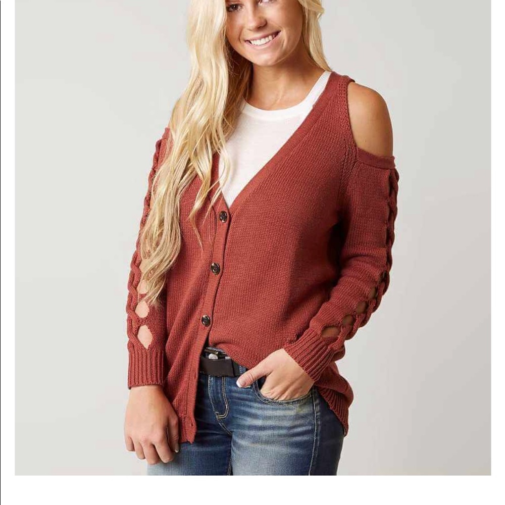Like new- cold shoulder sweater